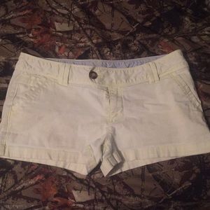 Red camel pastel yellow khakis